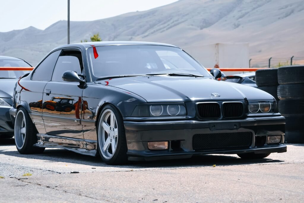 Black BMW E36 M3 at the track