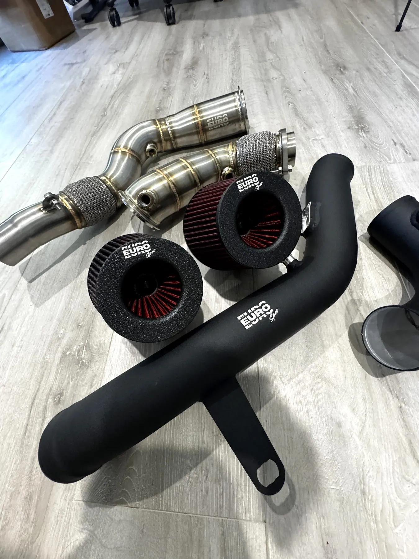 EuroSpec BMW catless downpipes, cold air intakes and charge pipe