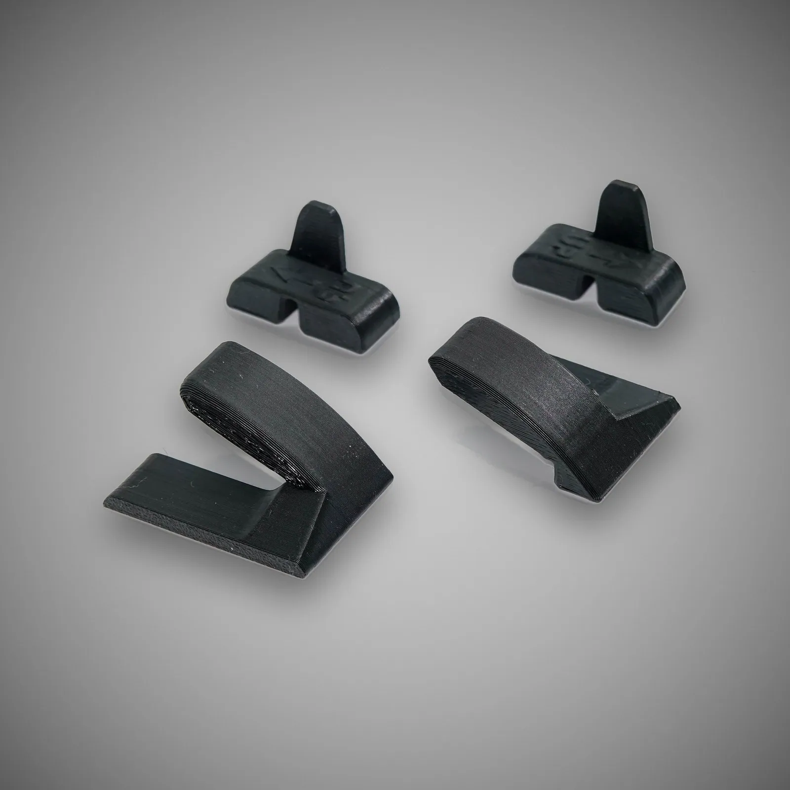 Rendition BMW E36 B pillar repair tabs — grey studio