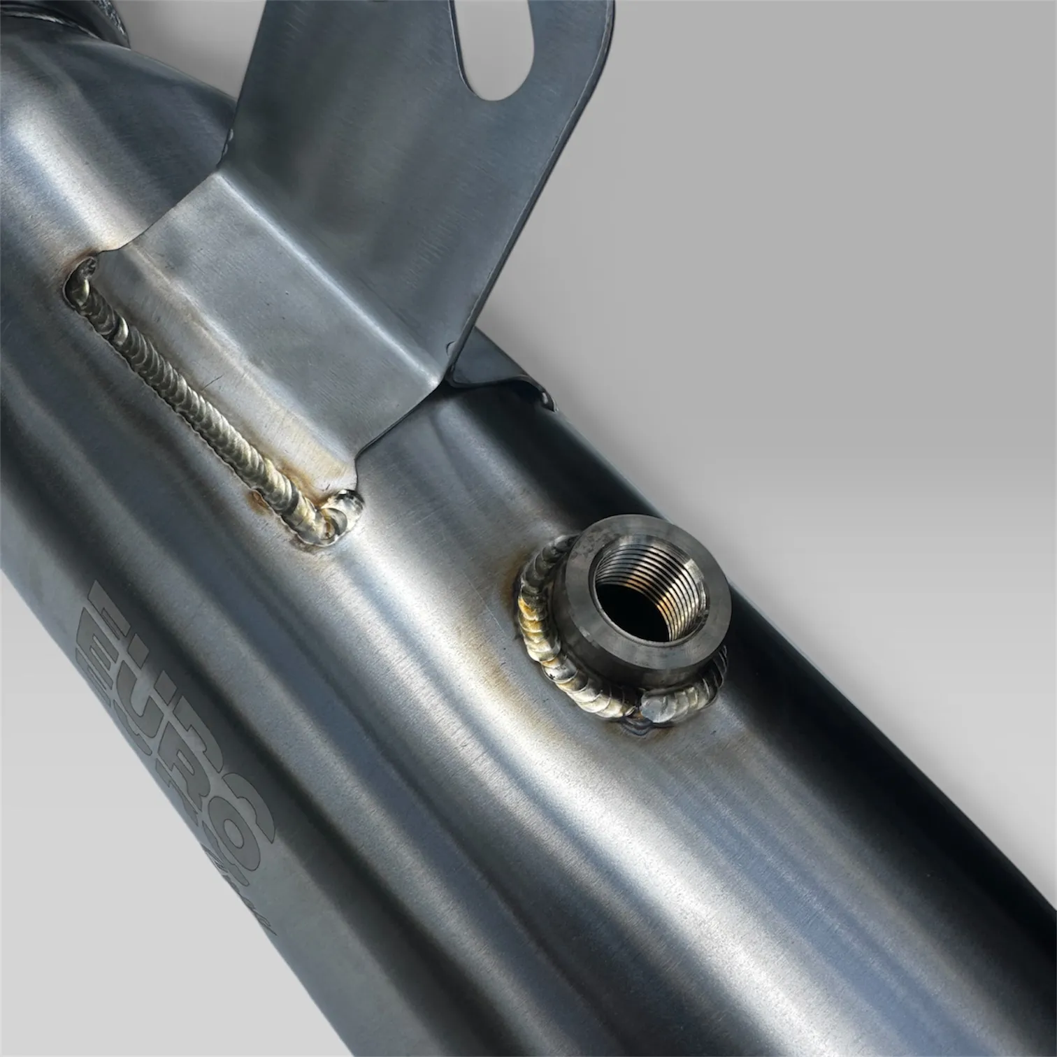 TIG-welded mounting bracket and O2 sensor bung on the EuroSpec BMW B58 downpipe