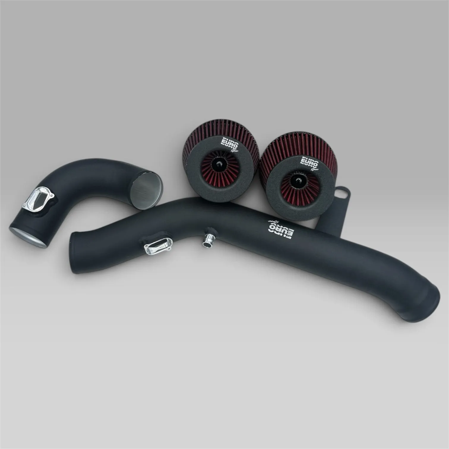 EuroSpec BMW S55 cold air intake kit laid out on a grey backdrop